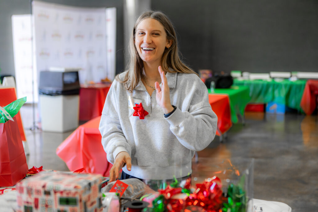 volunteer wrapping gifts